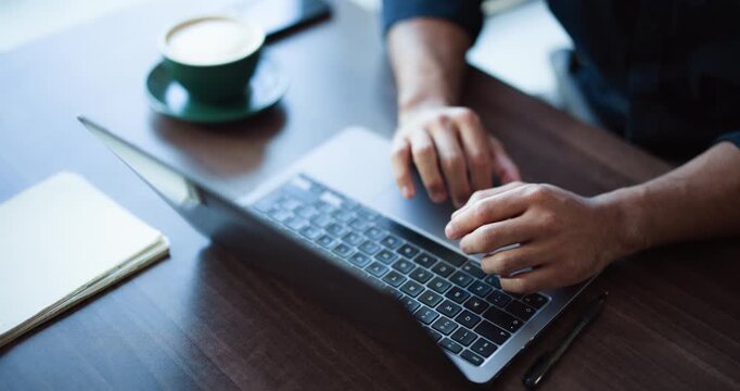 Laptop, hands and businessman in office with typing for research on finance report for budget. Technology, email and male financial advisor with computer for investment proposal in workplace.