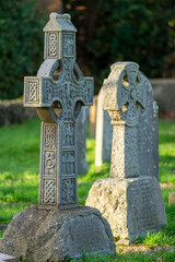Ancient gravestones in the graveyard of Holy Cross Church in Seend, Wiltshire. 
