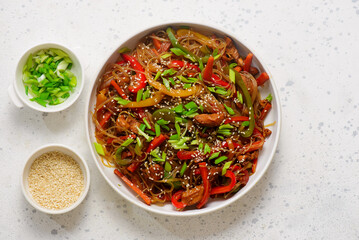 Funchoza with chicken and vegetables and teriyaki sauce