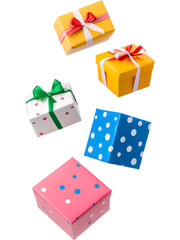 .Colorful Christmas gift boxes in green, red, and white tones floating on transparent background. Playful festive arrangement perfect for holiday graphics