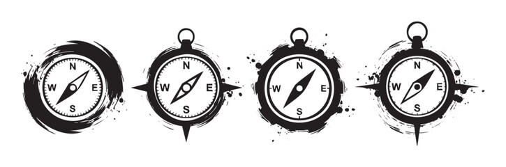 Four stylized compass designs with grunge texture and directional pointers offer a vintage navigation theme for adventure, exploration, and travel concepts.