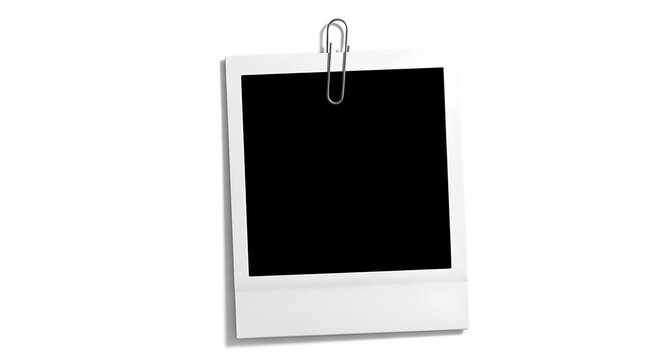 Blank instant film photograph with a silver paperclip attached isolated on a clean white background for copy space