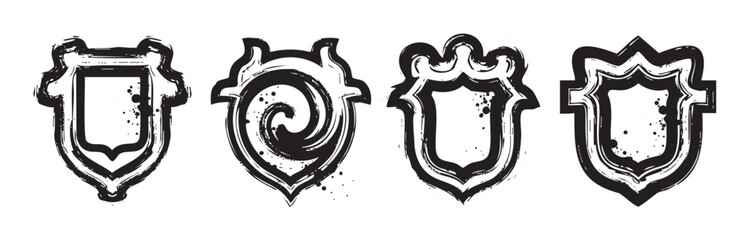 Four unique grunge shields with distressed brush stroke textures and various shapes, ideal for emblems, logos, or decorative design elements.