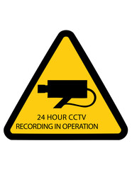 24 hour CCTV Recording in Operation. Warning sign with a camera pictogram on a yellow triangle. Used for security and surveillance notification.