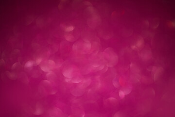 Abstract bokeh light on pink background. Pink holiday background with bokeh, flare light, overlay effect. Festive Valentines Day.