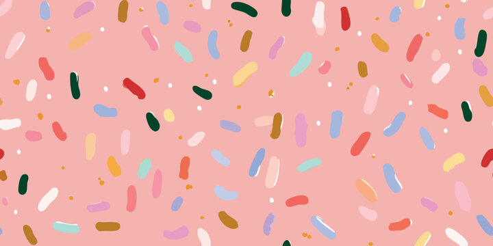 Playful vector repeating pattern with abstract colorful painterly brush strokes and sprinkles on a pastel pink background for design, kids' textiles, and fun packaging