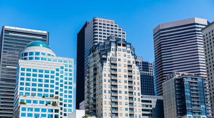 Fototapeta premium Cityscape of skyscraper building in business district. City architecture of skyscraper. City building cityscape view. Skyscraper cityscape. Modern city downtown. Business city