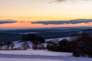 Snowy Hills at Colorful Winter Sunset in the Rh&ouml;n, Germany