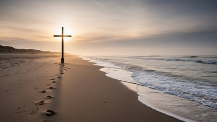 Silhouette of a wooden cross on a sandy beach with footprints leading to it at sunrise, symbolizing faith and journey.