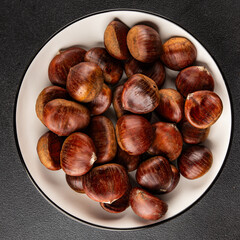 Edible chestnuts delicious treat tasty snack fresh gourmet food background on table rustic food top view copy space