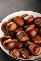 Edible chestnuts delicious treat tasty snack fresh gourmet food background on table rustic food top view copy space