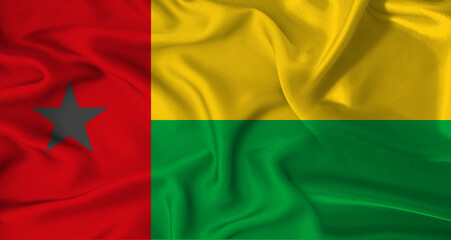 Realistic Guinea Bissau flag waving. Close up of flag of Guinea Bissau with cloth texture