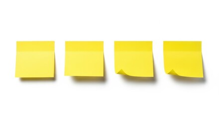 Fototapeta premium Four blank yellow sticky notes aligned on white