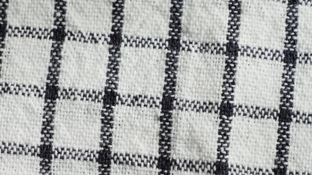 Black checkered fabric. Close up of texture.