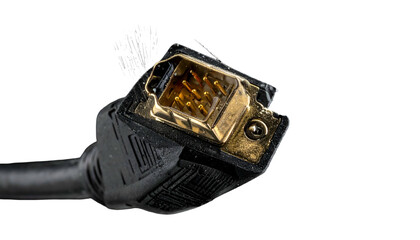 Fototapeta premium Close-up of a damaged, angled, black video cable connector with gold pins