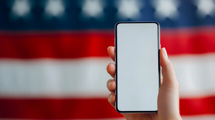 A hand holds a smartphone against the backdrop of a blurred national flag. The phone screen is blank, offering space for content.  The flag's colors add a patriotic touch.