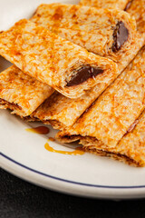 Crepes with chocolate sweet dessert tasty snackfresh gourmet food background on the table  rustic food top view copy space