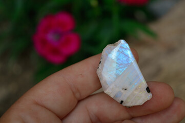hand with moonstone gem