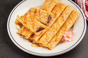 Crepes with chocolate sweet dessert tasty snackfresh gourmet food background on the table  rustic food top view copy space