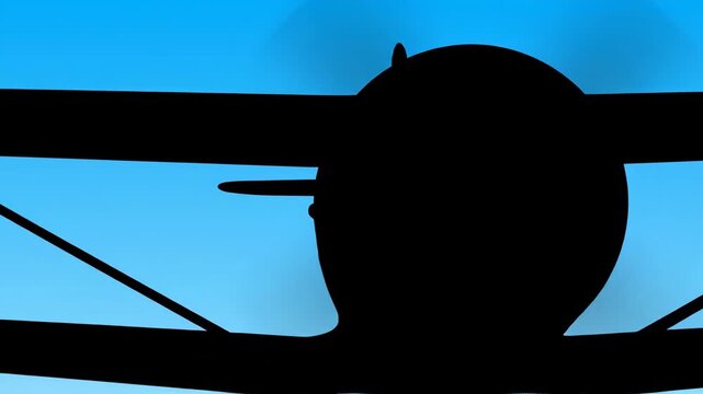 Silhouette of a Biplane Against a Clear Blue Sky, Vintage Aircraft in Flight.
