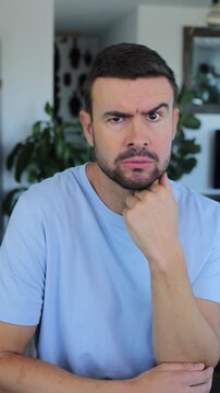 Suspicious man figuring something out