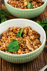 Traditional buckwheat porridge with chicken meat.