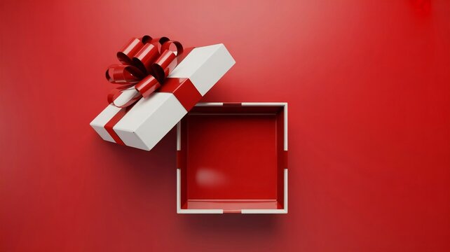 White gift box with red ribbon on red background