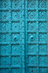 Blue painted wall. Jodhpur door in the blue city