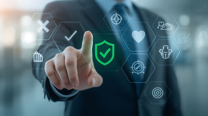 Business professional uses a futuristic transparent digital interface featuring hexagonal icons, including a glowing green shield symbolizing security.