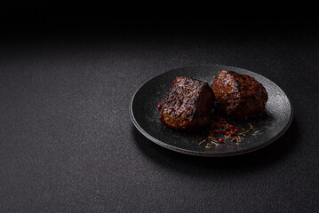 Grilled or barbecued beef steak, a fillet of meat cooked for dinner. Beef steak