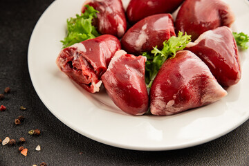 Turkey heart offal meat tasty snack fresh delicious gourmet food background on the table  rustic food top view copy space
