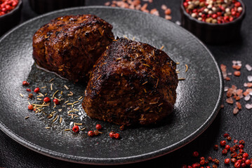 Grilled or barbecued beef steak, a fillet of meat cooked for dinner. Beef steak