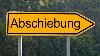 Verkehrszeichen,Richtungszeichen, mit dem Aufdruck Abschiebung