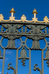 Beautiful wrought iron gate design in Saint Petersburg, Russia during sunny day