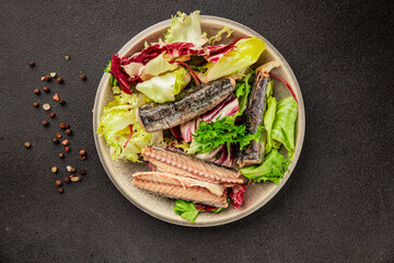 Mackerel salad canned fish, lettuce leaves tasty snack fresh delicious gourmet food table setting rustic food top view copy space keto and paleo diet vegetarian and vegan food pescetarian diet