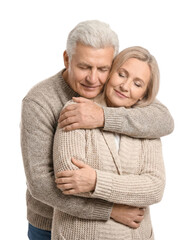Loving senior couple embracing affectionately with closed eyes