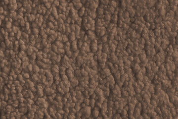 Vibrant brown color fabric texture of soft faux fur cloth with fluffy surface, abstract background. Close up, macro of shaggy fabric texture, upholstery material, textile backdrop © katyamaximenko