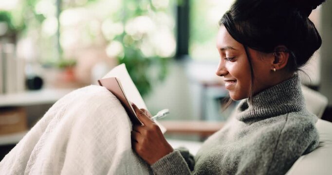 Diary, smile and writing with woman on sofa in living room of home for reflection or memories. Journaling, notebook and pen with happy person in apartment for agenda, personal growth or planning
