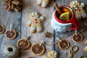 On the table there is New Year's tea 2026, coffee, gingerbread and pine cone cookies.