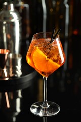 Refreshing spritzer cocktail on table in bar