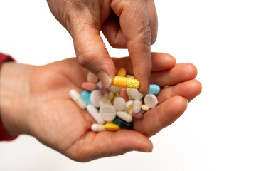 A woman who takes medication when she is sick. Excessive medication use negatively affects health.