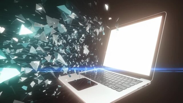 A laptop computer exploding into pieces with glowing blue light and shattered glass fragments flying everywhere around it, 4k video