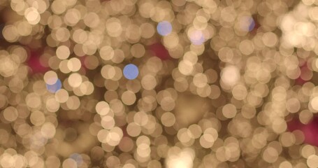 golden bokeh lights abstract holiday sparkle, warm outoffocus circles forming shimmering gold field with soft blue accents, - Powered by Adobe