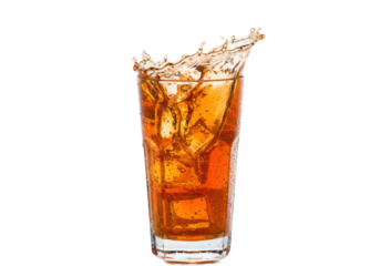 ultra-sharp close-up of an elegant highball glass of bright effervescent orange soda with condensation, ice, and a spectacular frozen crown splash against a transparent studio background. Concept for