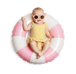 Cute little baby with sunglasses on inflatable ring against white background, top view