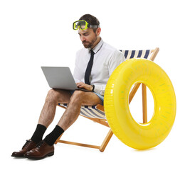 Businessman with laptop and diving mask in deck chair on white background
