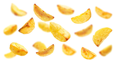 Baked potato wedges falling on white background