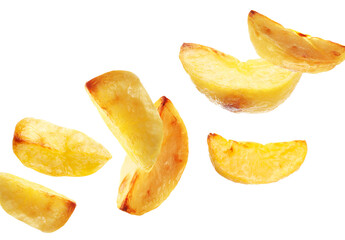 Baked potato wedges falling on white background