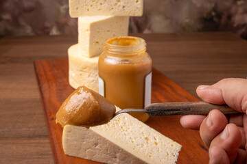 Cheese and dulce de leche, a wonderful dulce de leche from Minas Gerais together with a delicious cheese, selective focus.
