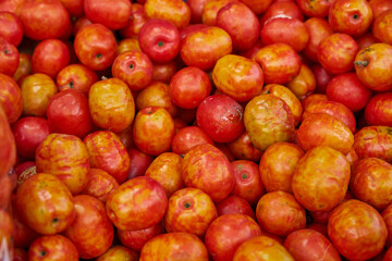 Fresh plums on display at market ciruela